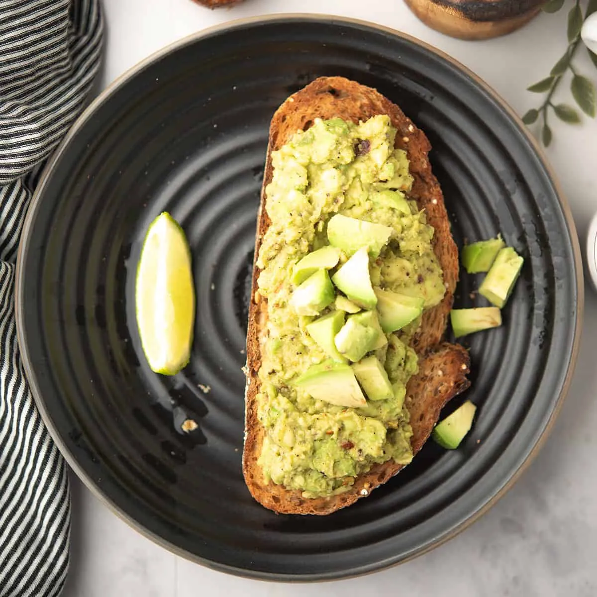 Fresh avocado toast on toasted multigrain bread at Fluff and Crunch in Warman, SK